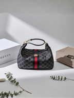 Gucci Vanity medium top handle bag black GG denim