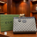 GUCCI GG Supreme Canvas Frame Zip Clutch Pouch