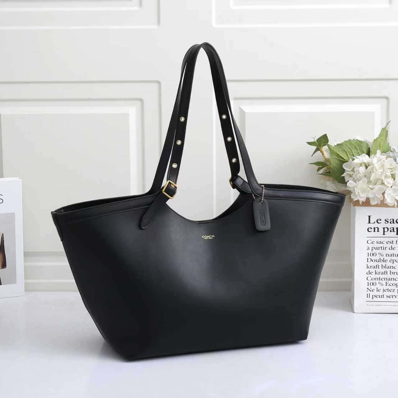 Coach Gramercy Tote Bag - Crafted Leather with Metallic Grommet Detailing