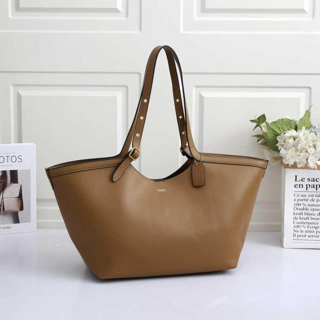 Coach Gramercy Tote Bag - Crafted Leather with Metallic Grommet Detailing