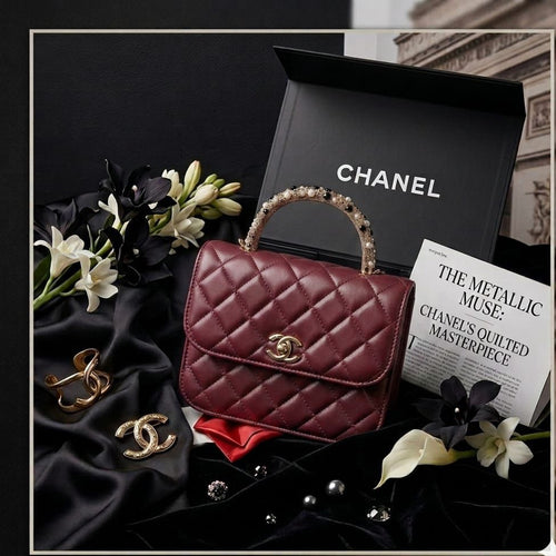 CHANEL Leather Top-Handle Bag with Embellished Handle